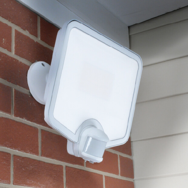 white Hyper Bright Light installed on a brick wall